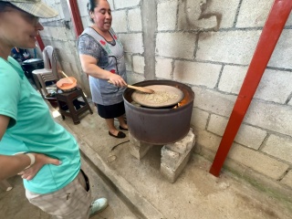 Alejandro’s wife teaching us to roast our own
