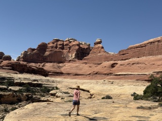 The trail goes up and over the left pass. Roughly